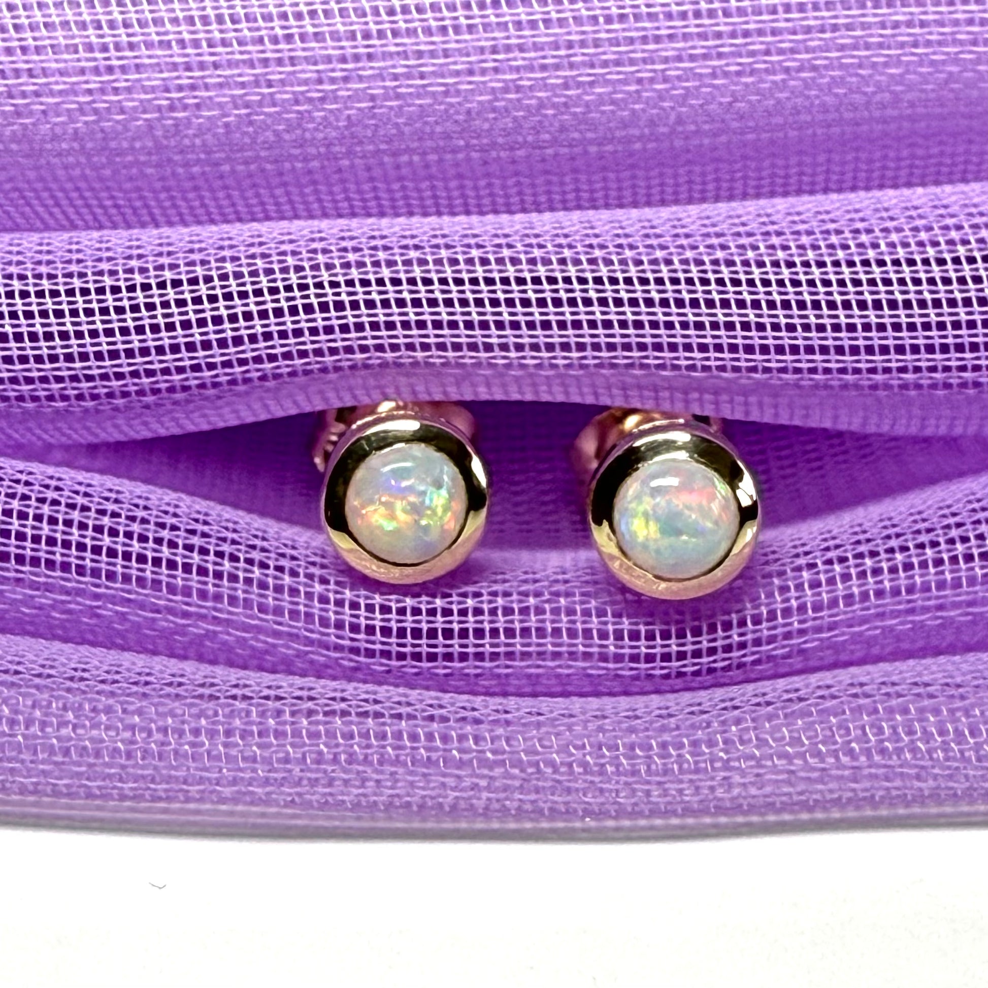 Pair of real opal earrings round yellow gold stud smooth rubbed over setting