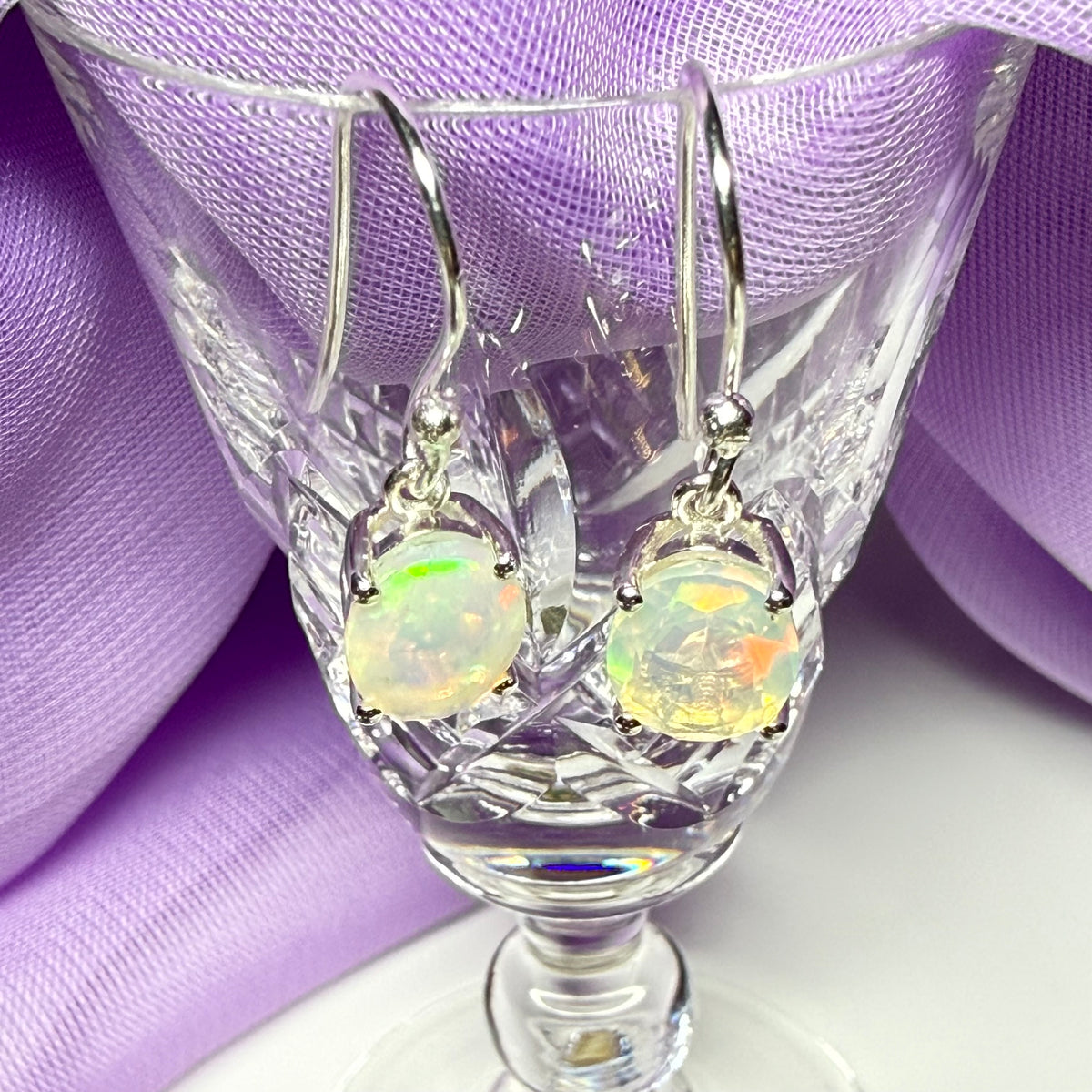 Real opal sterling silver oval shaped drop earrings