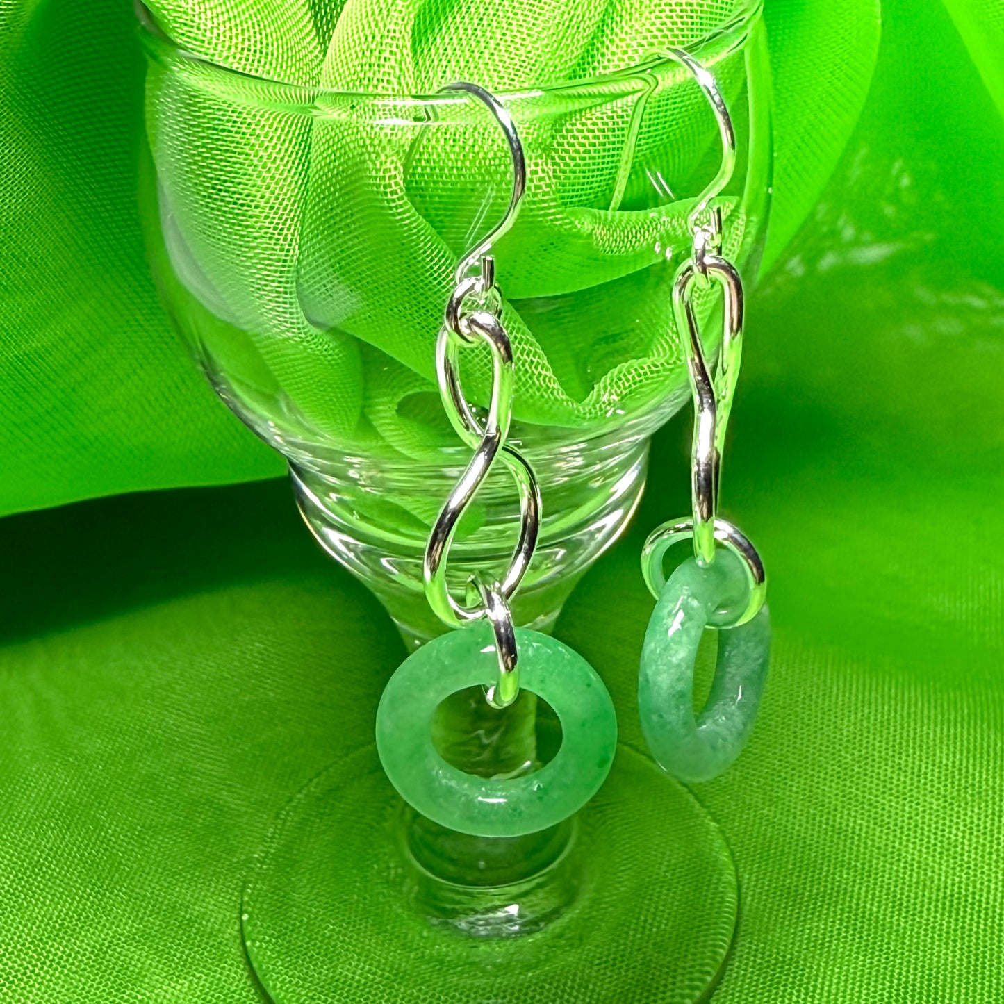 A rounded shaped real green jade sterling silver dangling dropped earrings
