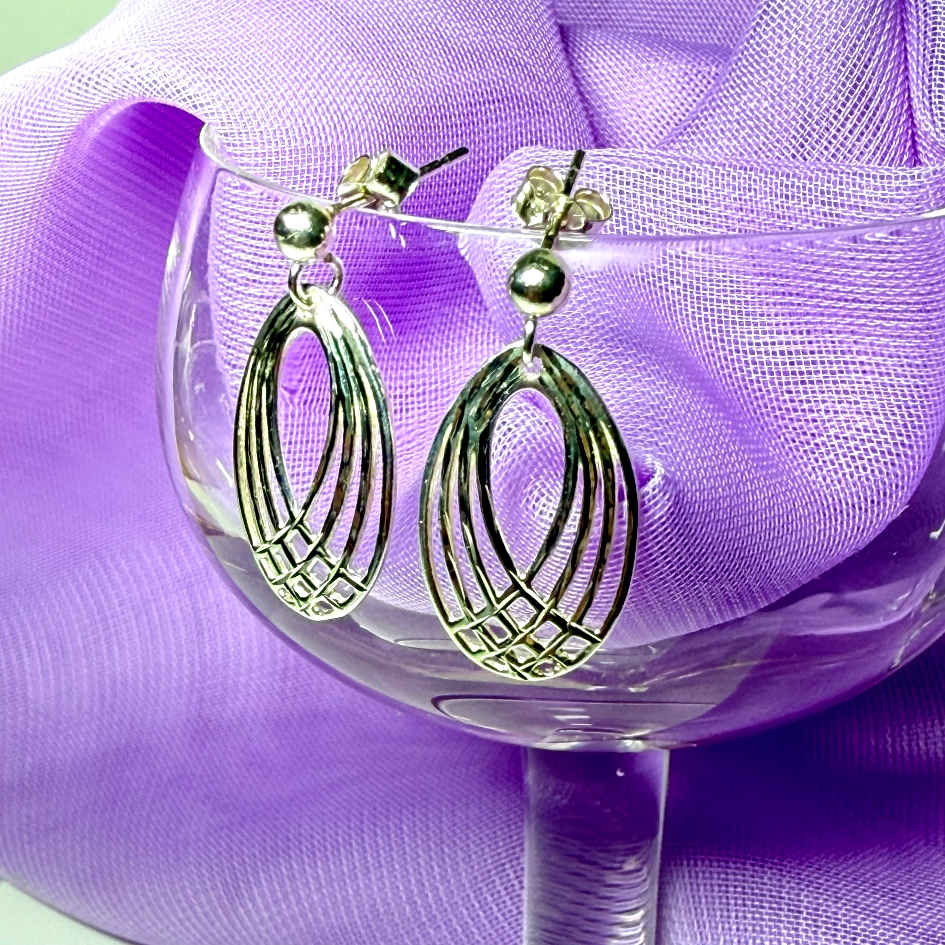 Oval shaped open drop earrings sterling silver