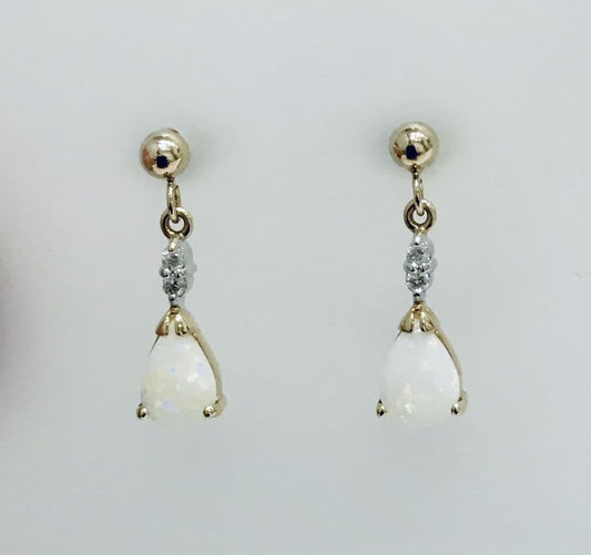 Pear shaped opal and diamond yellow gold drop earrings