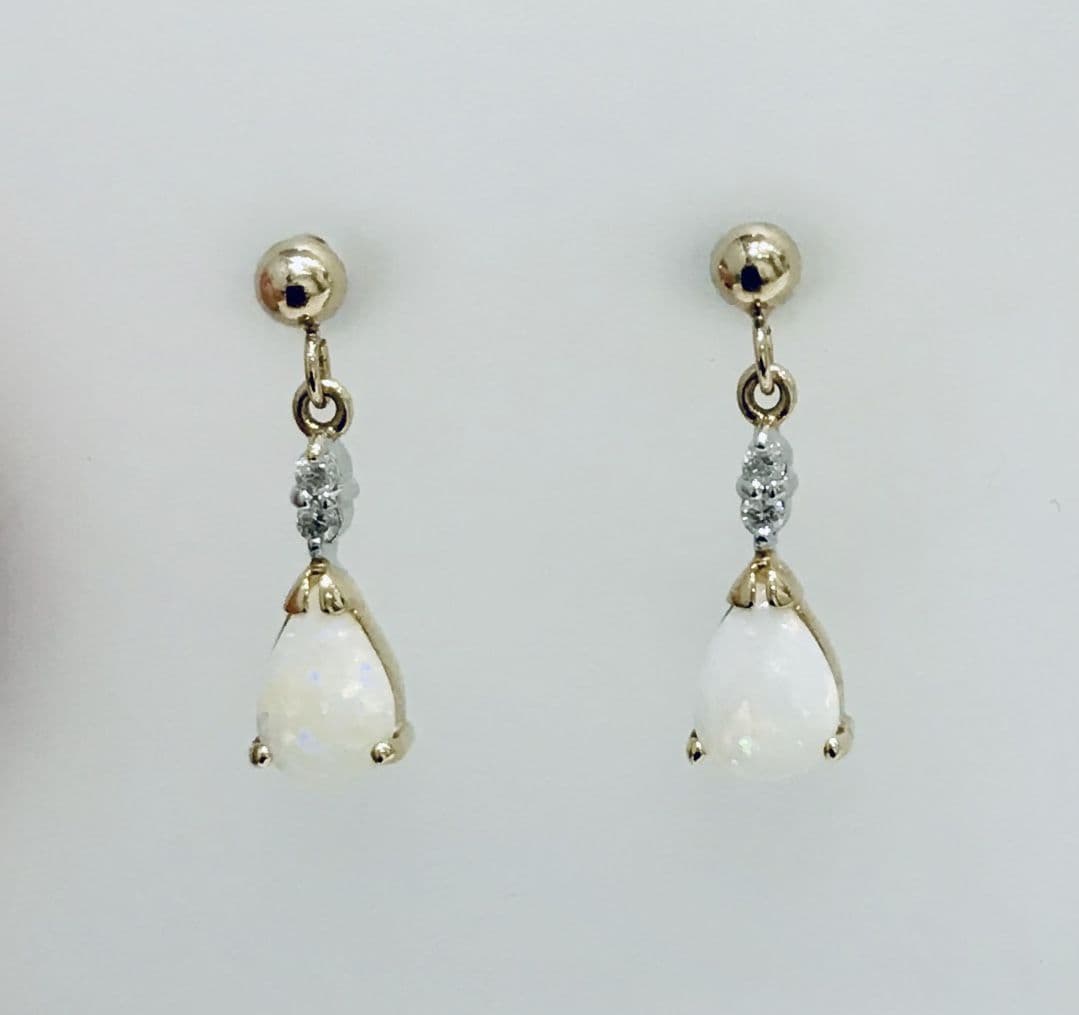 Pear shaped opal and diamond yellow gold drop earrings