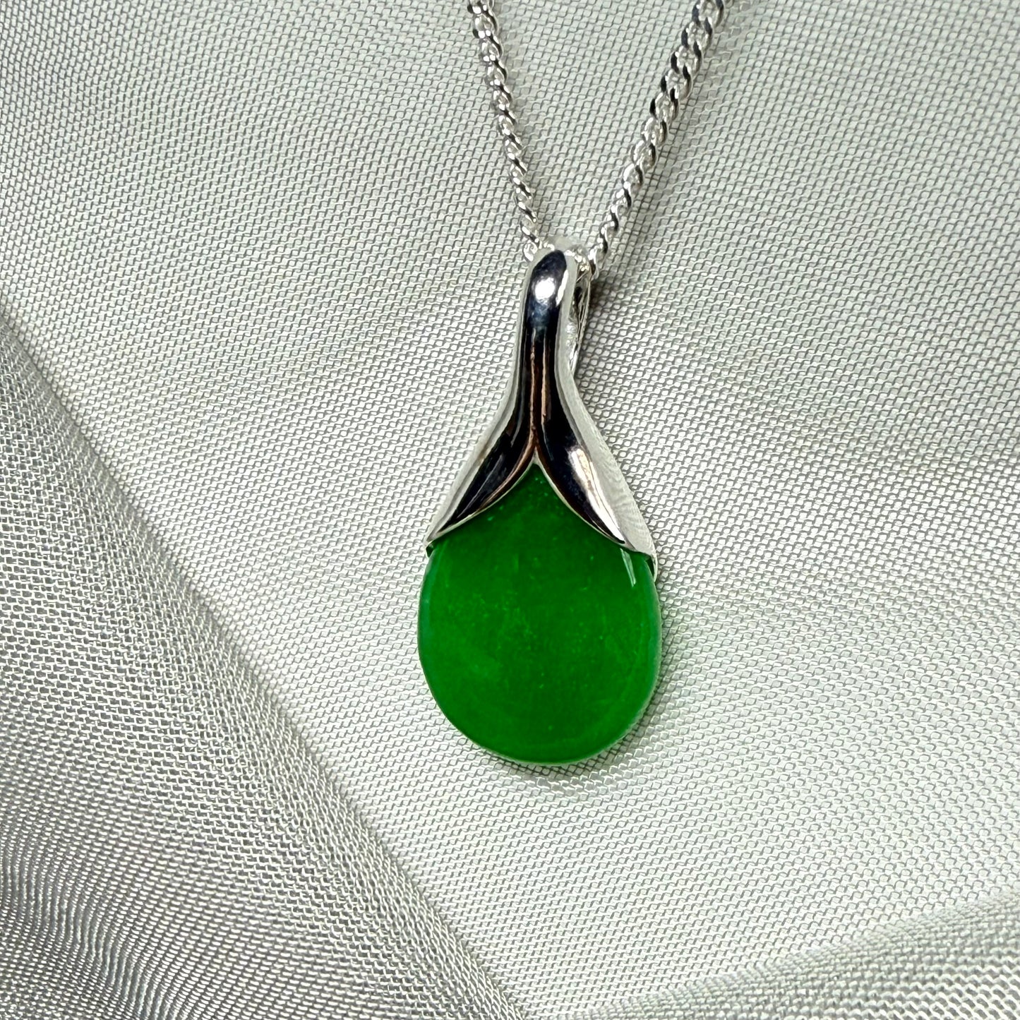 Pear shaped real green jade necklace including chain