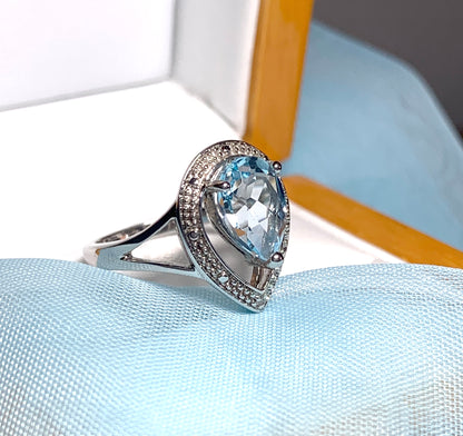 Pear shaped blue topaz sterling silver cluster ring