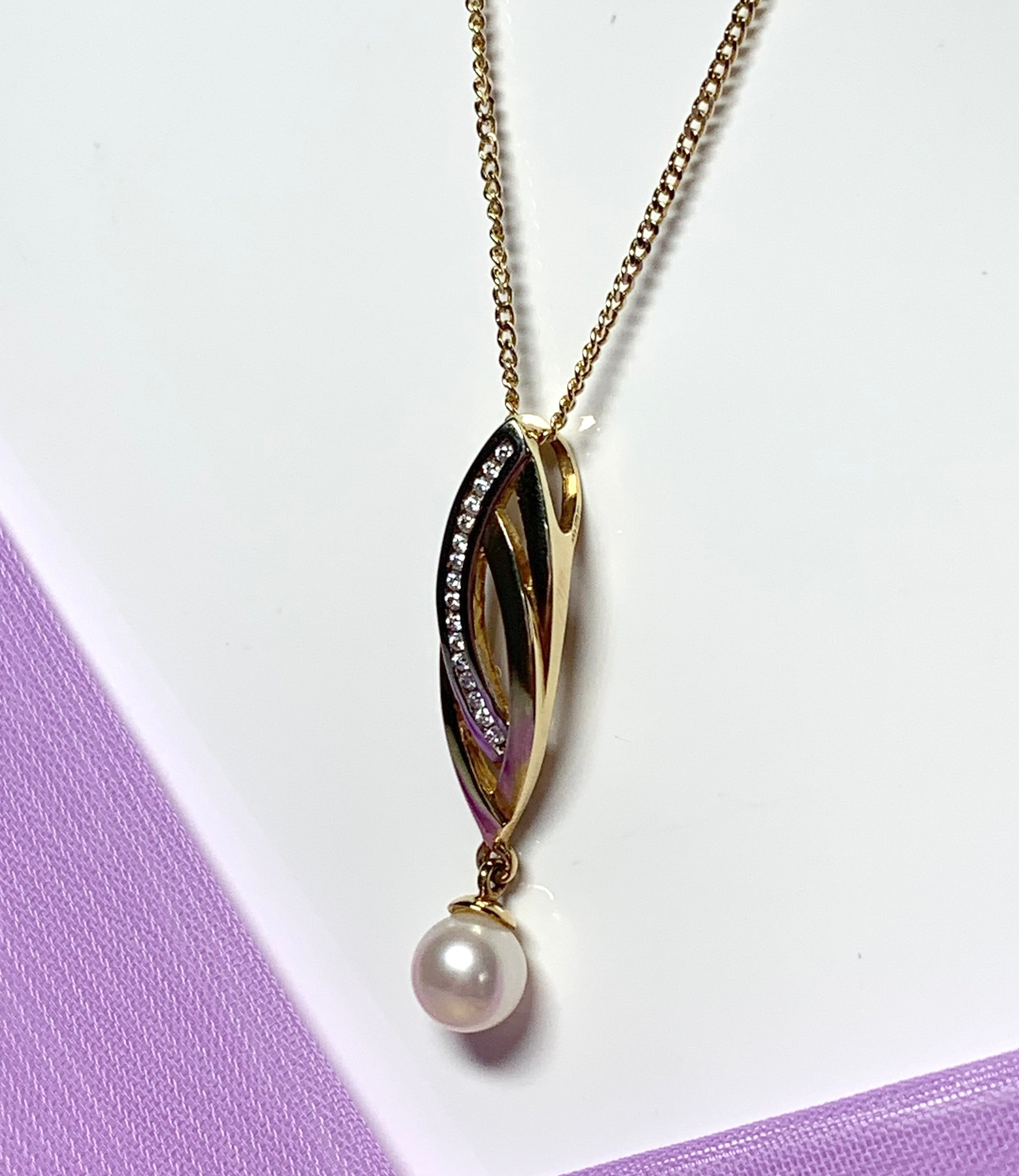 Pearl and cubic zirconia necklace freshwater cultured two tone gold pendant