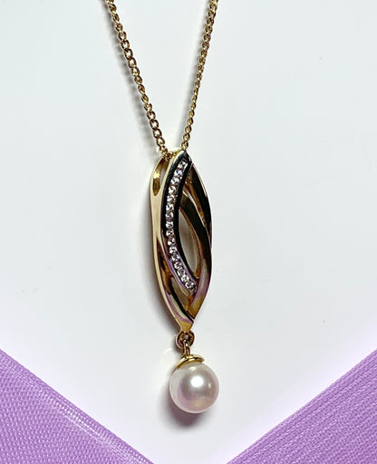 Pearl and cubic zirconia necklace freshwater cultured two tone gold pendant