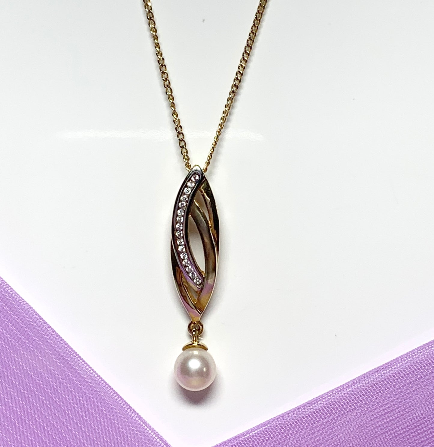 Pearl and cubic zirconia necklace freshwater cultured two tone gold pendant