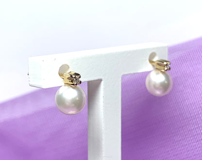 Pearl and diamond stud earrings yellow gold