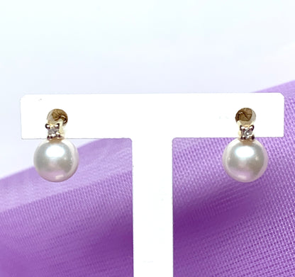 Pearl and diamond stud earrings yellow gold