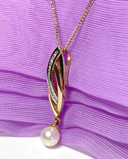 Pearl and cubic zirconia necklace freshwater cultured two tone gold pendant