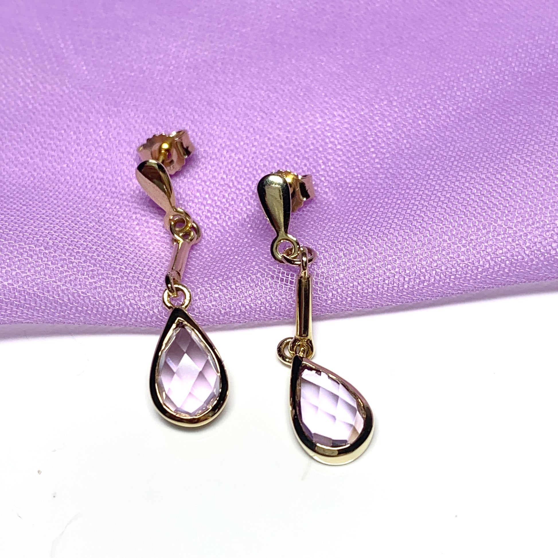 Pear shaped purple amethyst yellow gold drop earrings