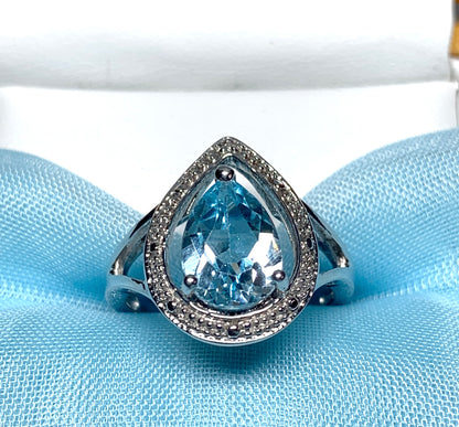 Pear shaped blue topaz sterling silver cluster ring