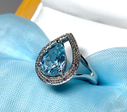 Pear shaped blue topaz sterling silver cluster ring