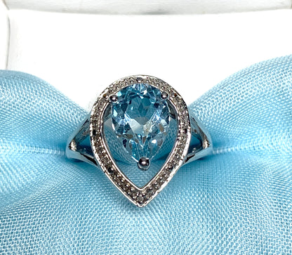 Pear shaped blue topaz sterling silver cluster ring