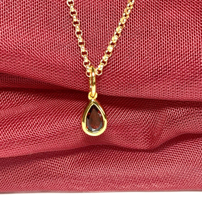 Pear shaped necklace set with a real red garnet stone sterling silver gilt including chain