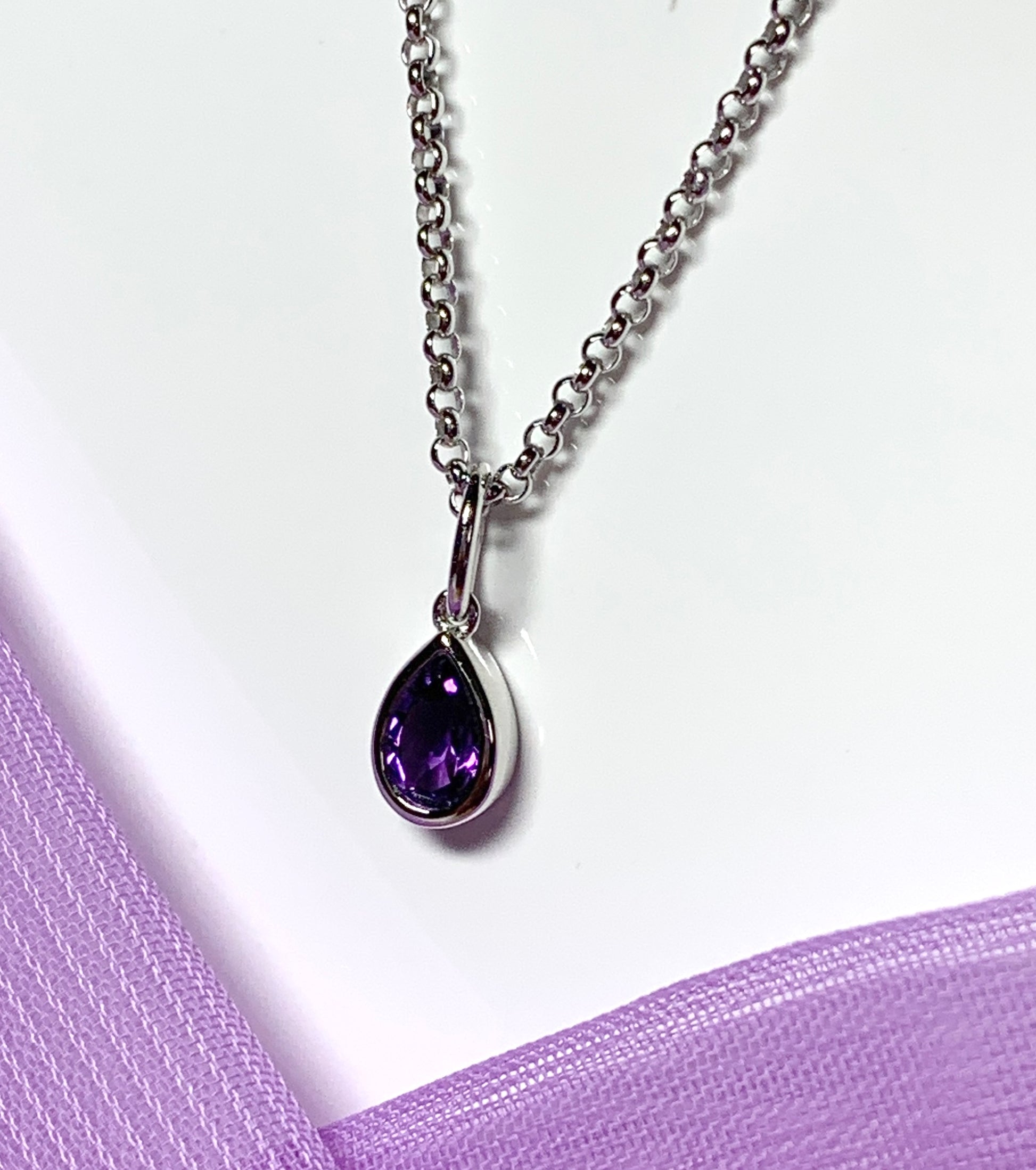 Pear shaped necklace set with a real amethyst stone sterling silver including chain