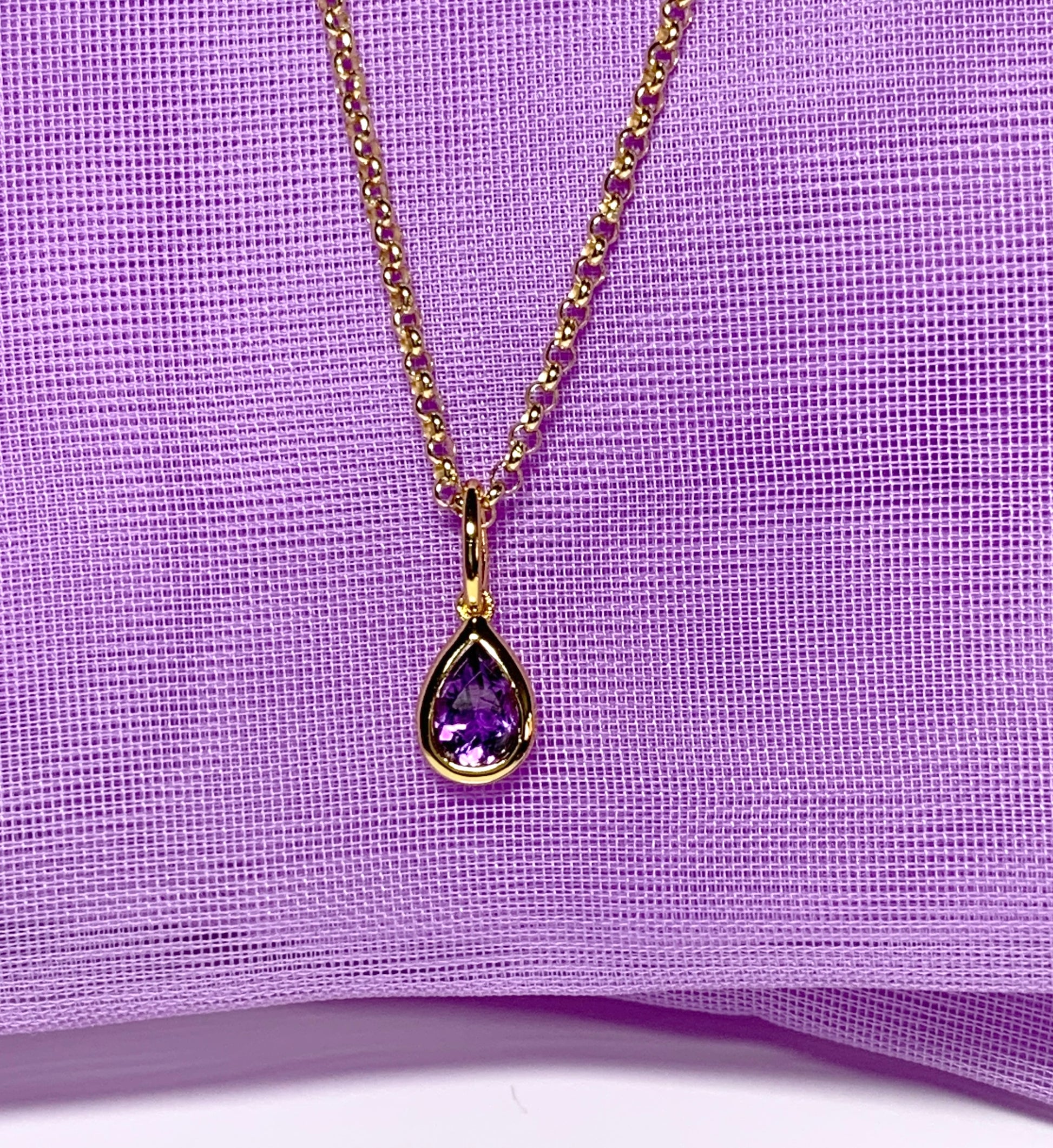 Pear shaped necklace set with a real amethyst stone sterling silver gilt including chain