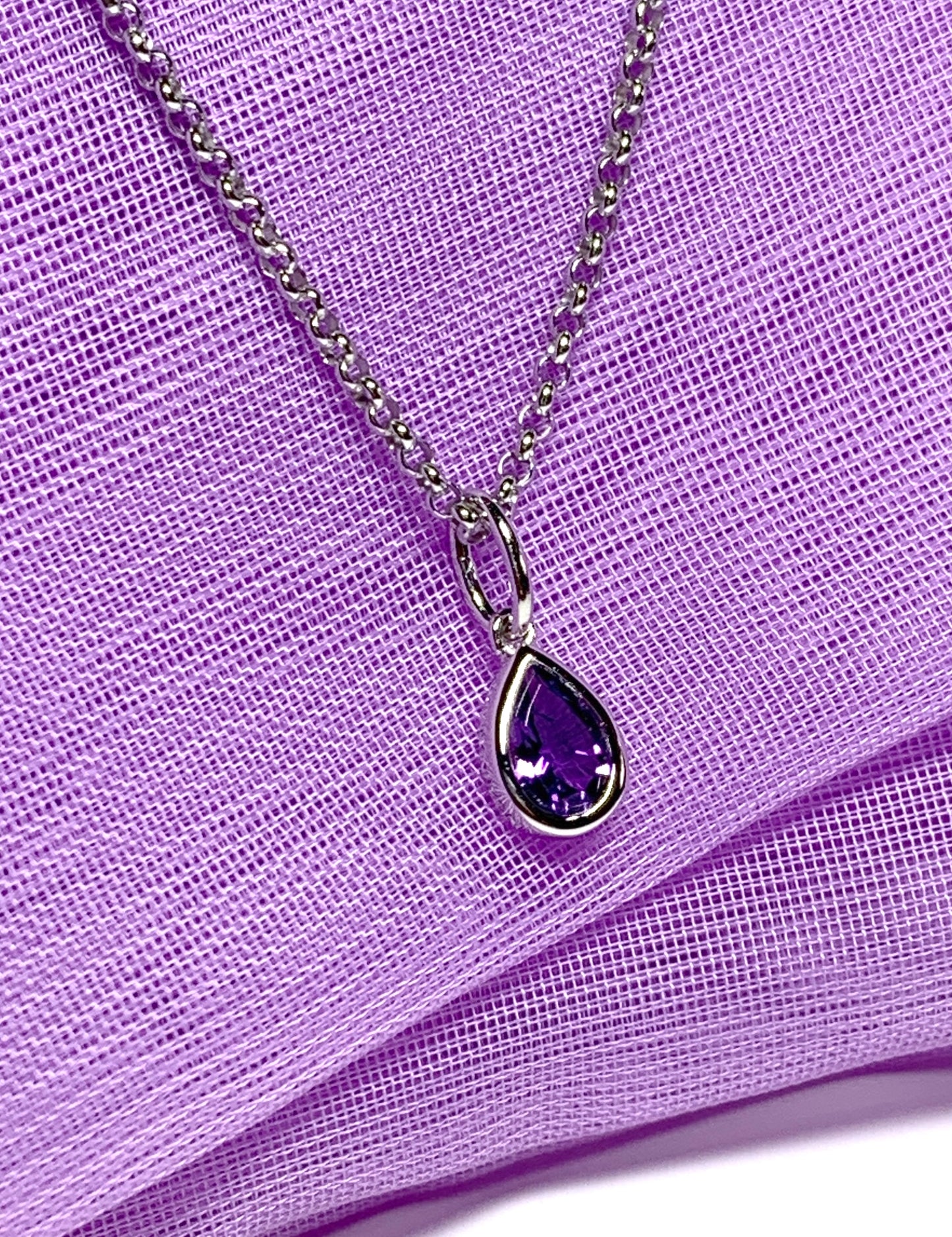 Pear shaped necklace set with a real amethyst stone sterling silver including chain