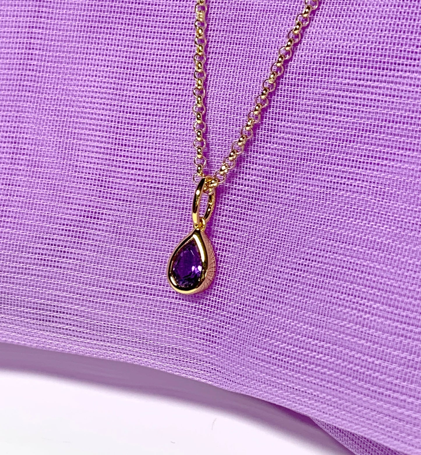 Pear shaped necklace set with a real amethyst stone sterling silver gilt including chain