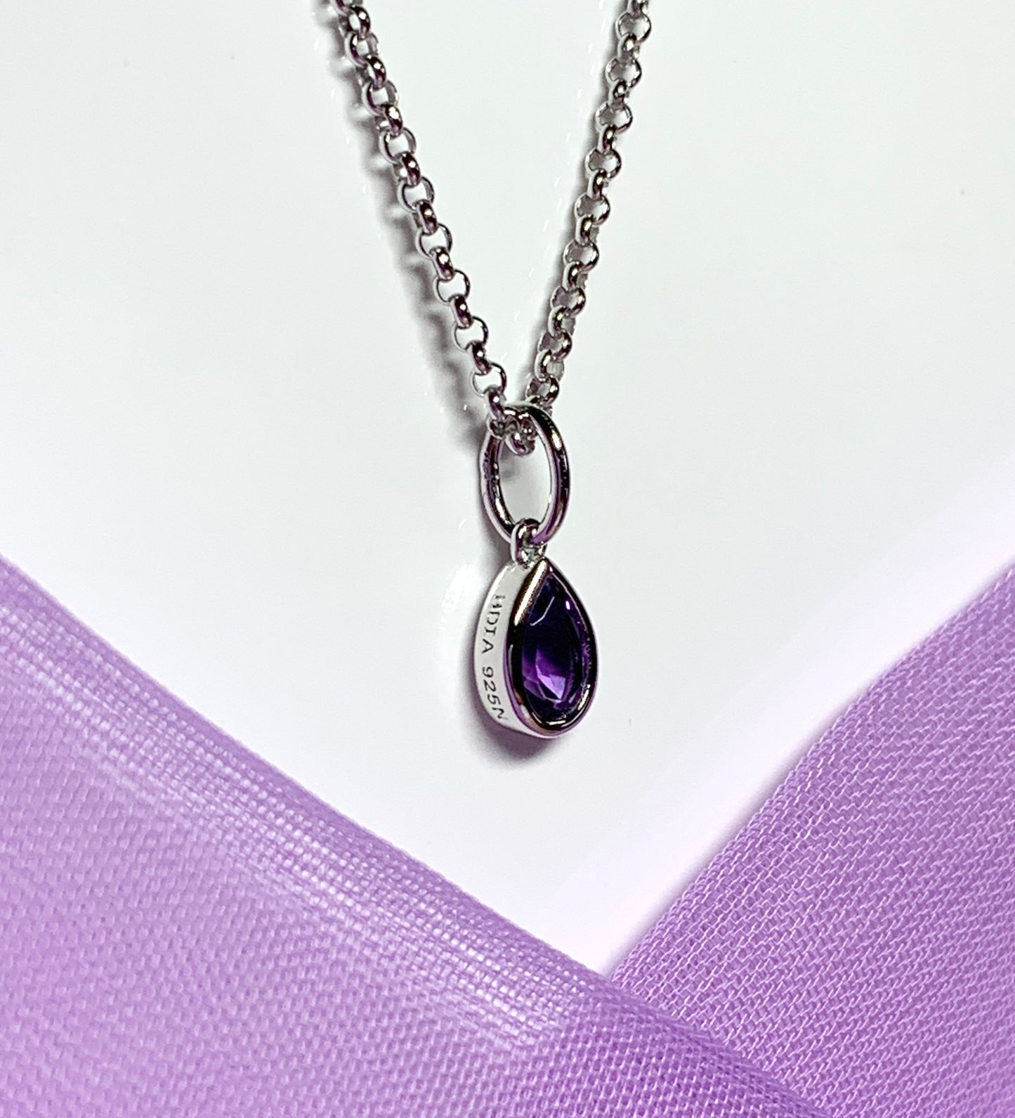 Pear shaped necklace set with a real amethyst stone sterling silver including chain