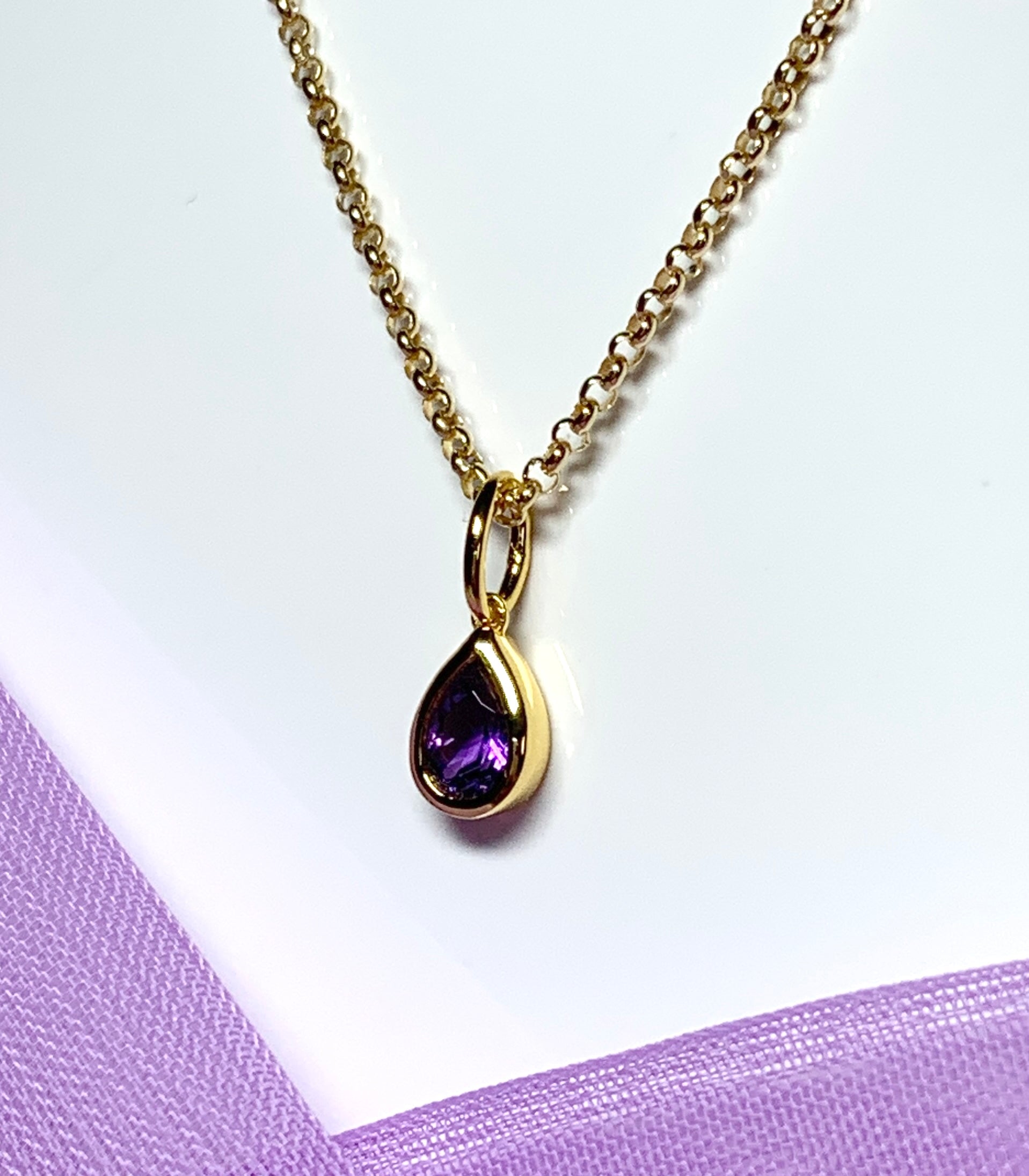 Pear shaped necklace set with a real amethyst stone sterling silver gilt including chain