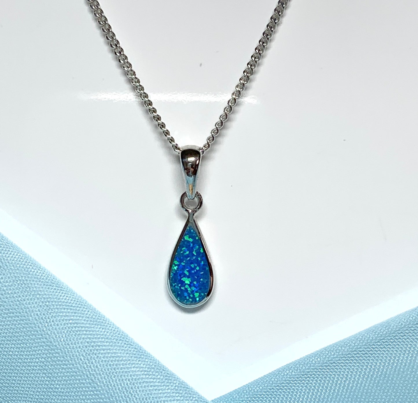 Pear shaped necklace teardrop sterling silver blue dark opal pendant