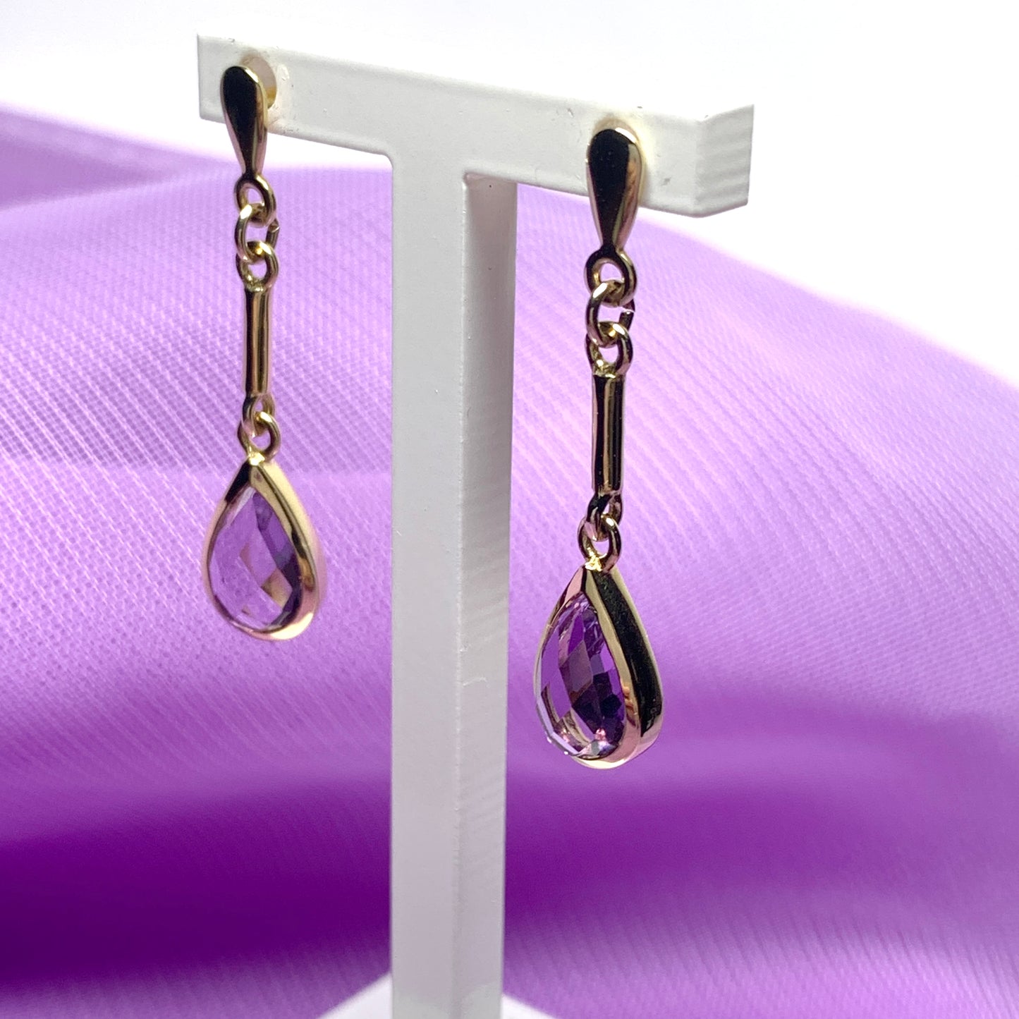 Pear shaped purple amethyst yellow gold drop earrings