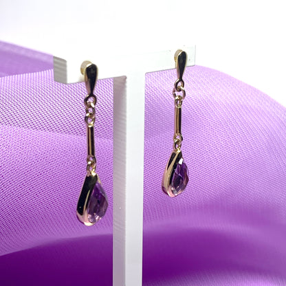 Pear shaped purple amethyst yellow gold drop earrings