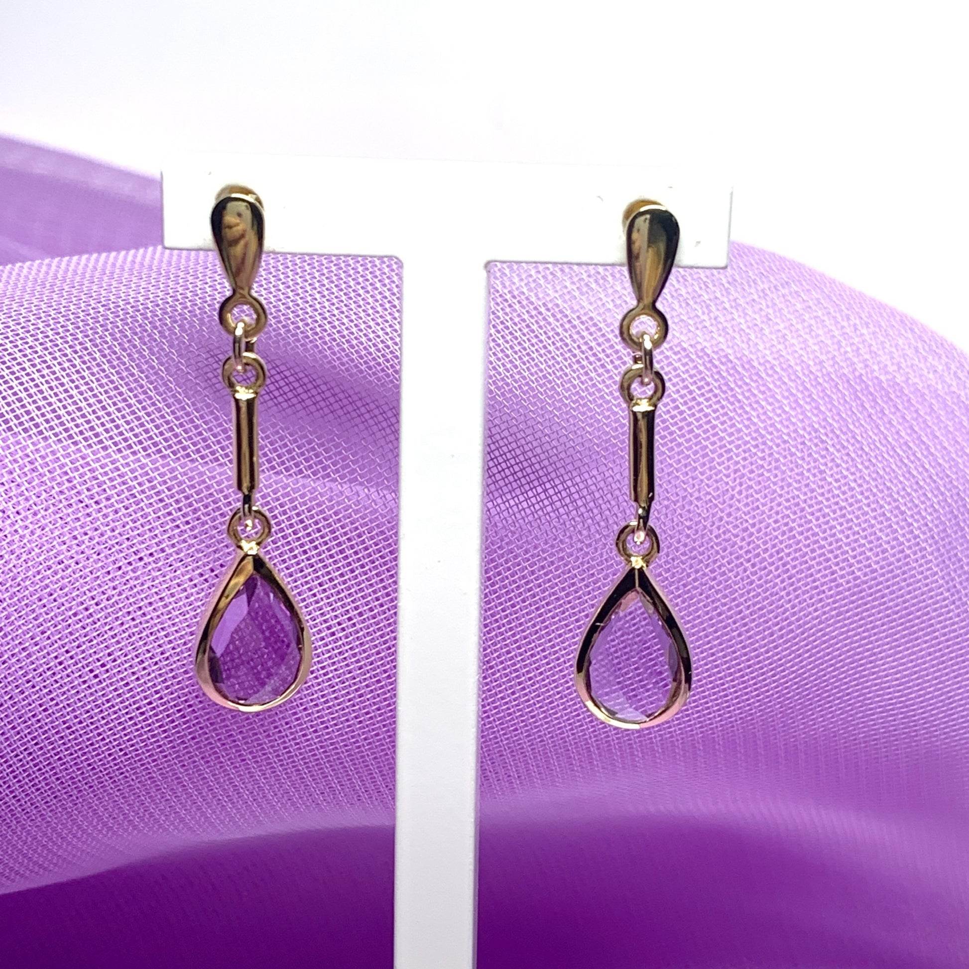 Pear shaped purple amethyst yellow gold drop earrings