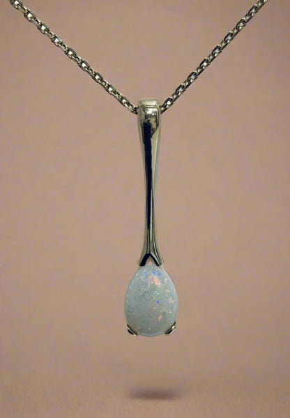 Pear shaped real opal yellow gold long necklace pendant