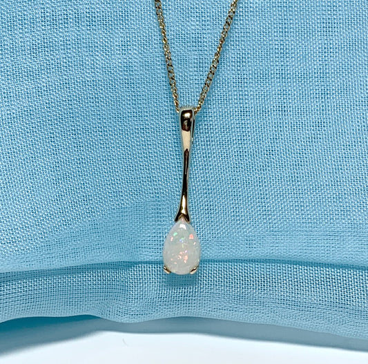 Pear shaped real opal yellow gold long necklace pendant