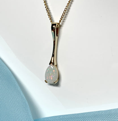 Pear shaped real opal yellow gold long necklace pendant