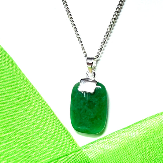 Pendant necklace having a real green jade stone sterling silver cushion shape, a timeless design