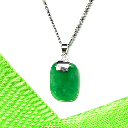 Pendant necklace having a real green jade stone sterling silver cushion shape, a timeless designed pendant