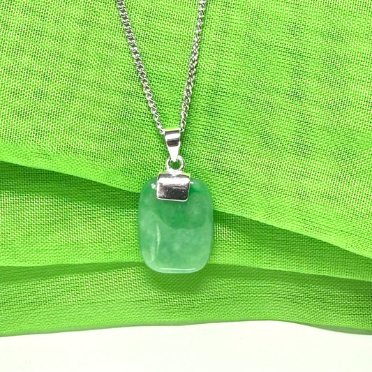 Pendant necklace having a real green jade stone sterling silver cushion shape, a timeless designed pendant