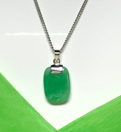 Pendant necklace having a real green jade sterling silver cushion shaped