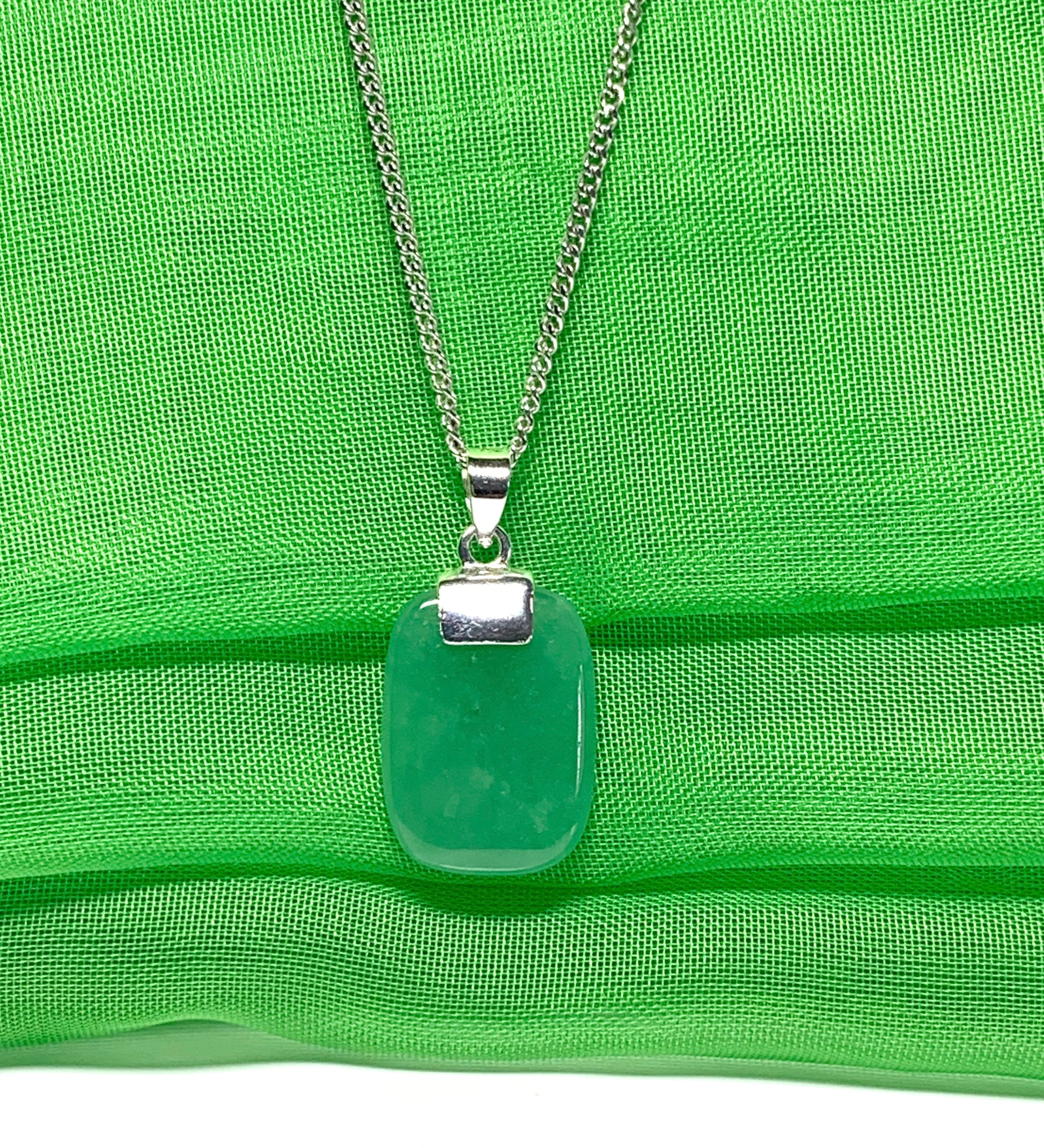 Pendant necklace having a real green jade stone sterling silver cushion shape