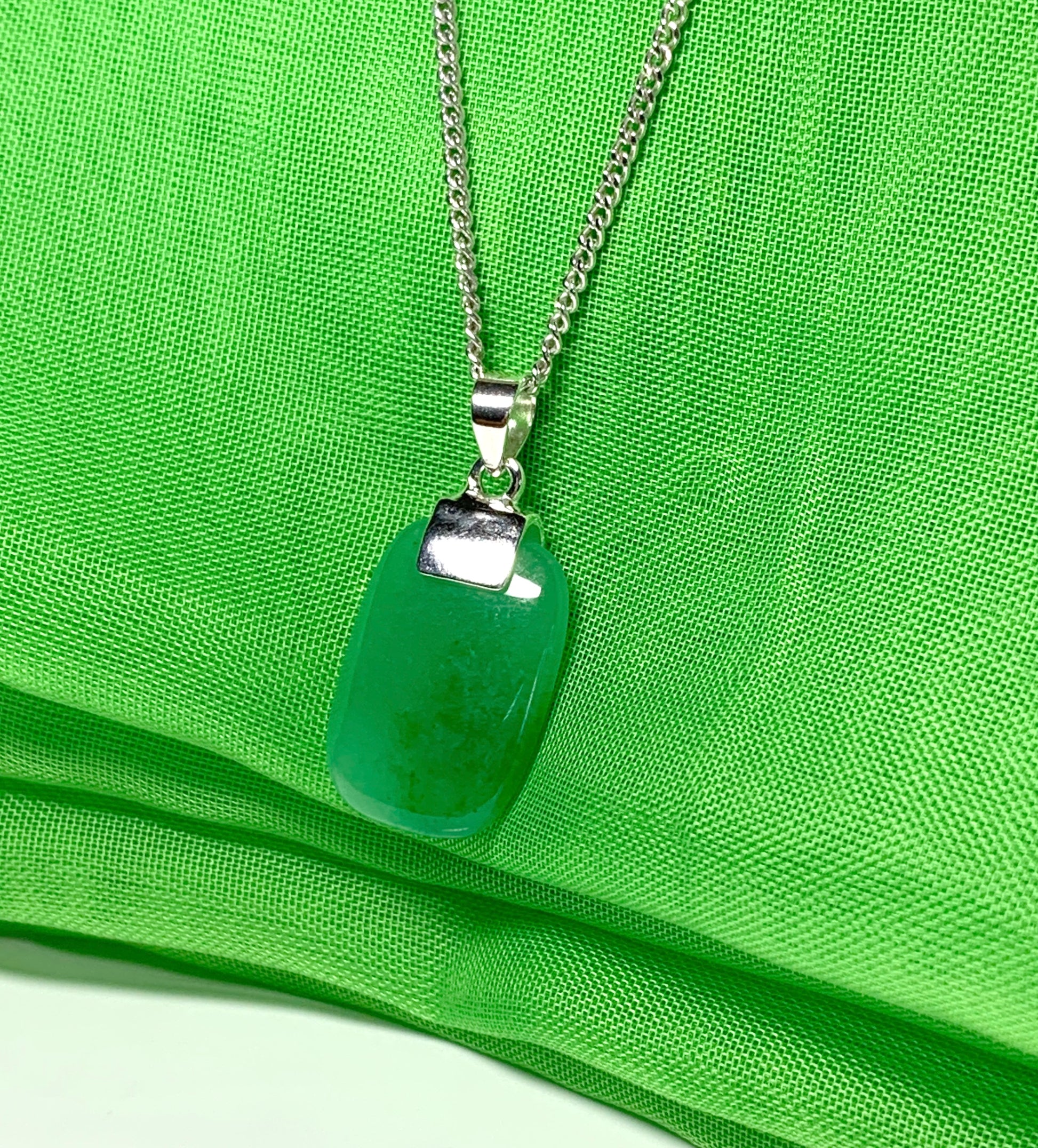 Pendant necklace having a real green jade stone sterling silver cushion shaped