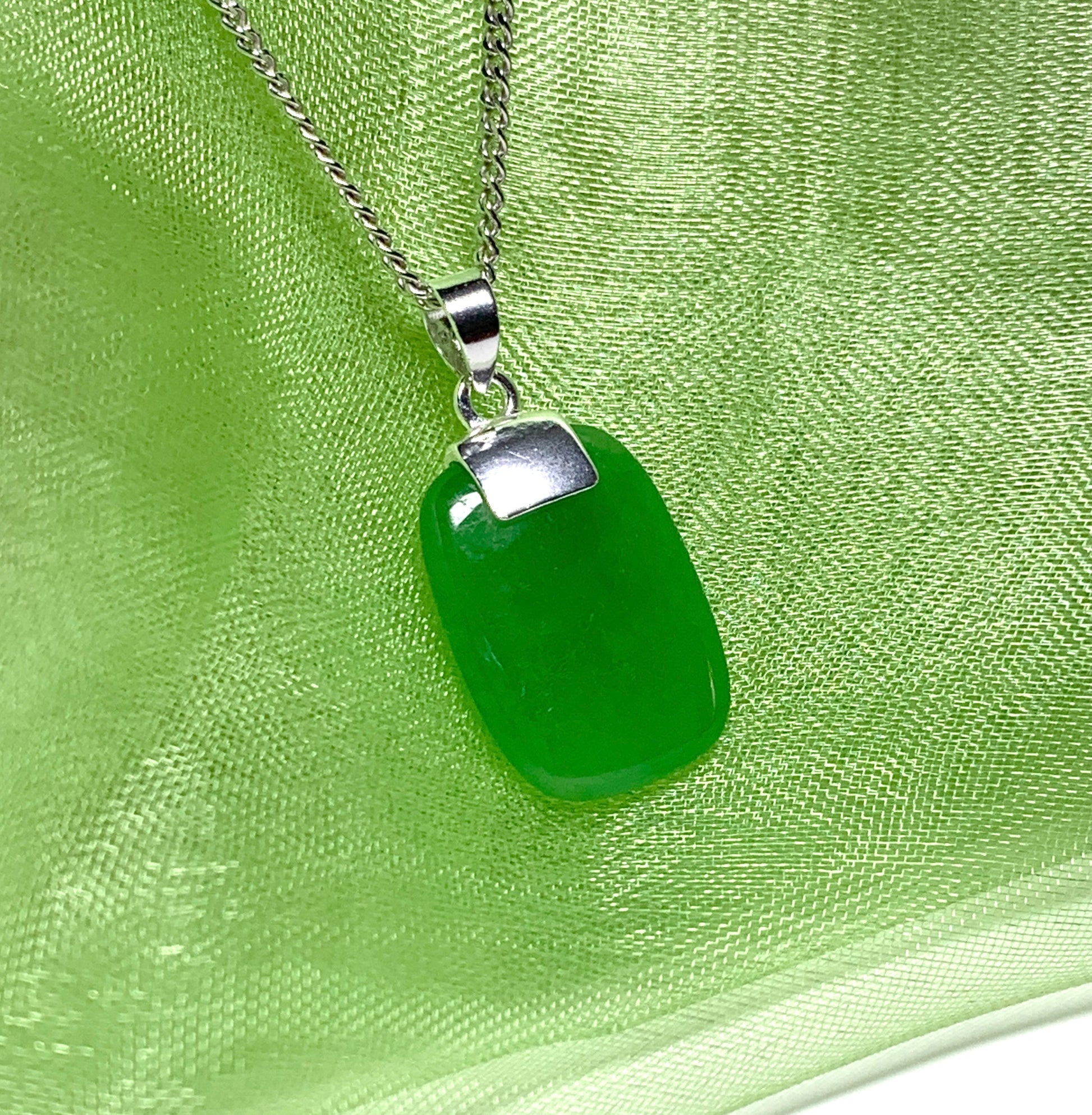 Drop pendant necklace with a real green jade sterling silver cushion shaped