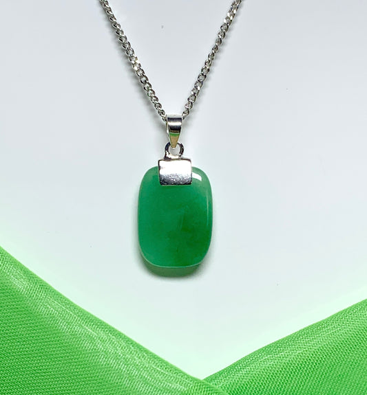 Pendant necklace having a real green jade stone sterling silver cushion shaped