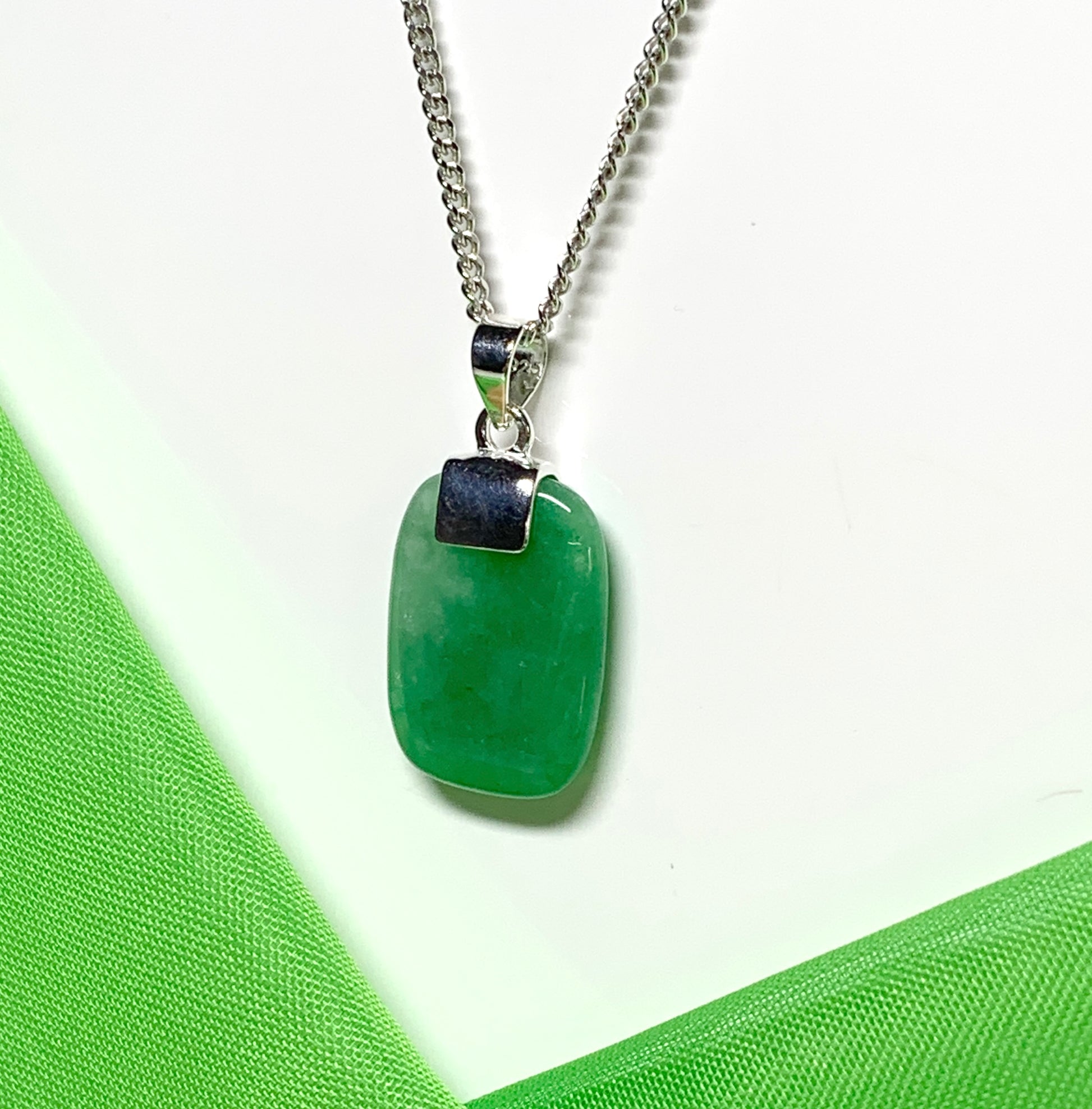 Pendant with a real green jade sterling silver cushion shaped necklace