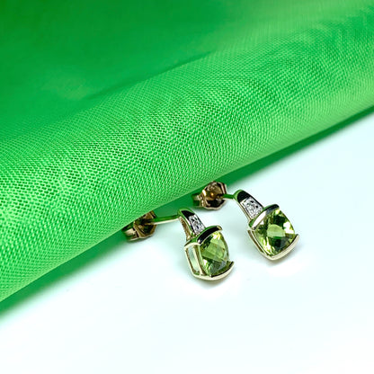 Peridot and diamond yellow gold cushion shaped earrings