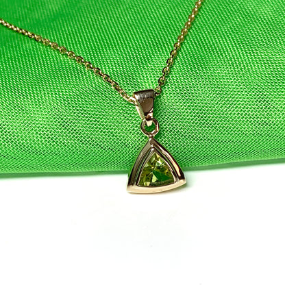 Peridot gold trillion cut necklace