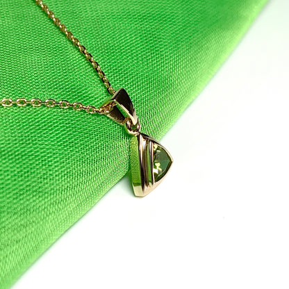 Peridot gold trillion cut necklace