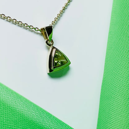 Peridot gold trillion cut necklace