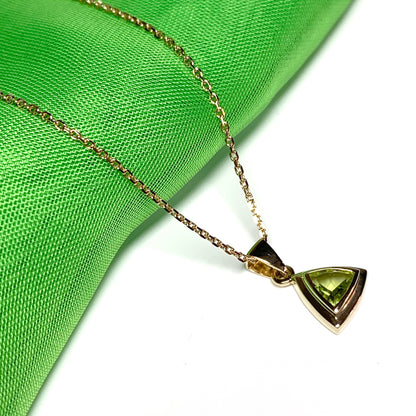 Peridot gold trillion cut necklace