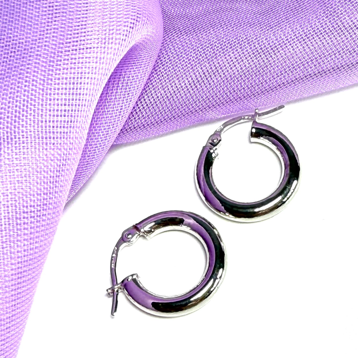 Plain highly polished white gold hoop earrings 16 mm