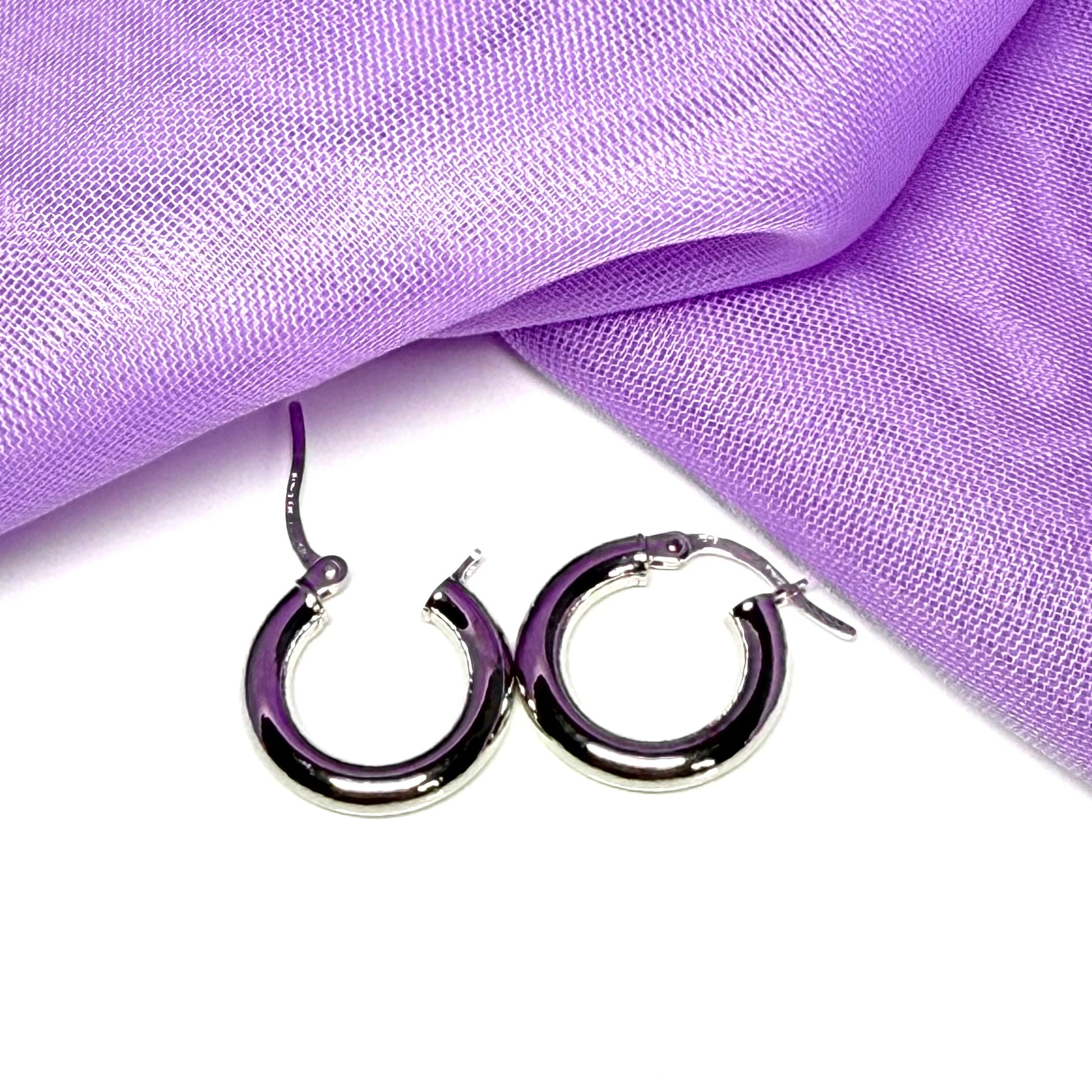 Plain highly polished white gold hoop earrings 16 mm