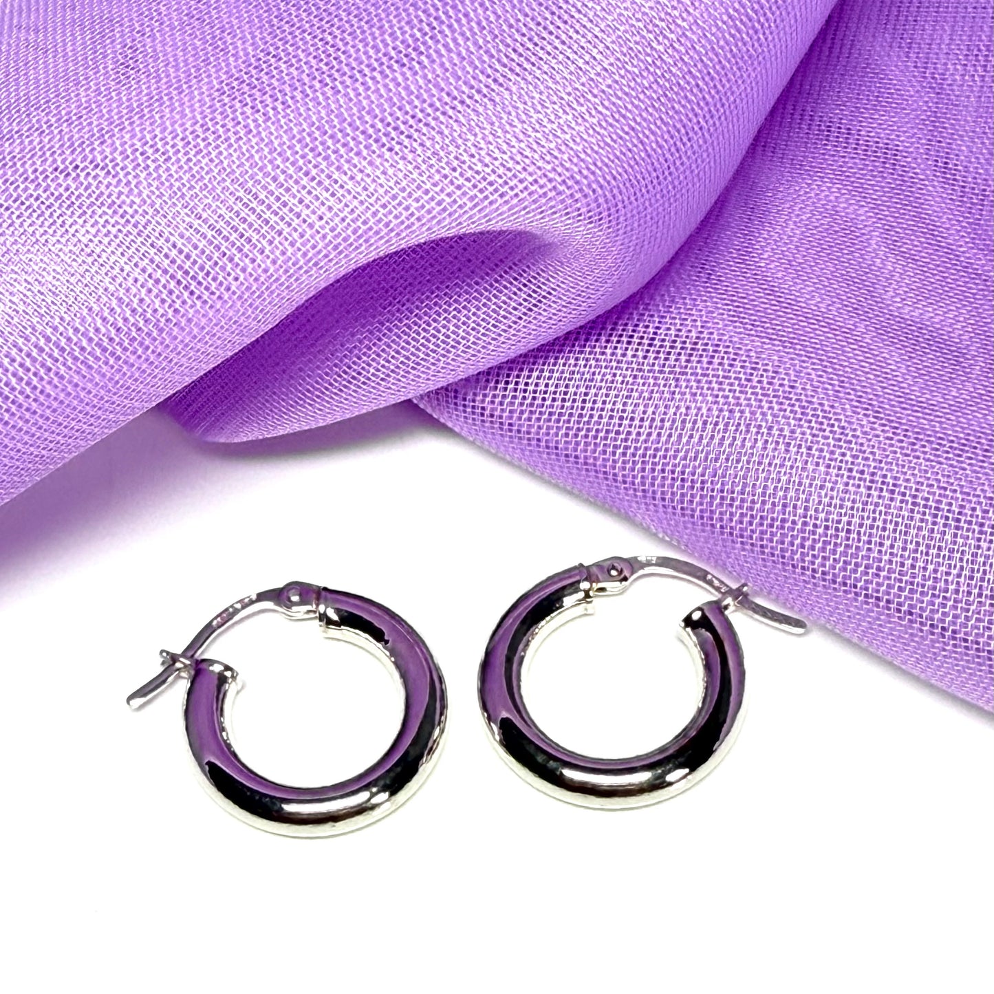 Plain highly polished white gold hoop earrings 16 mm