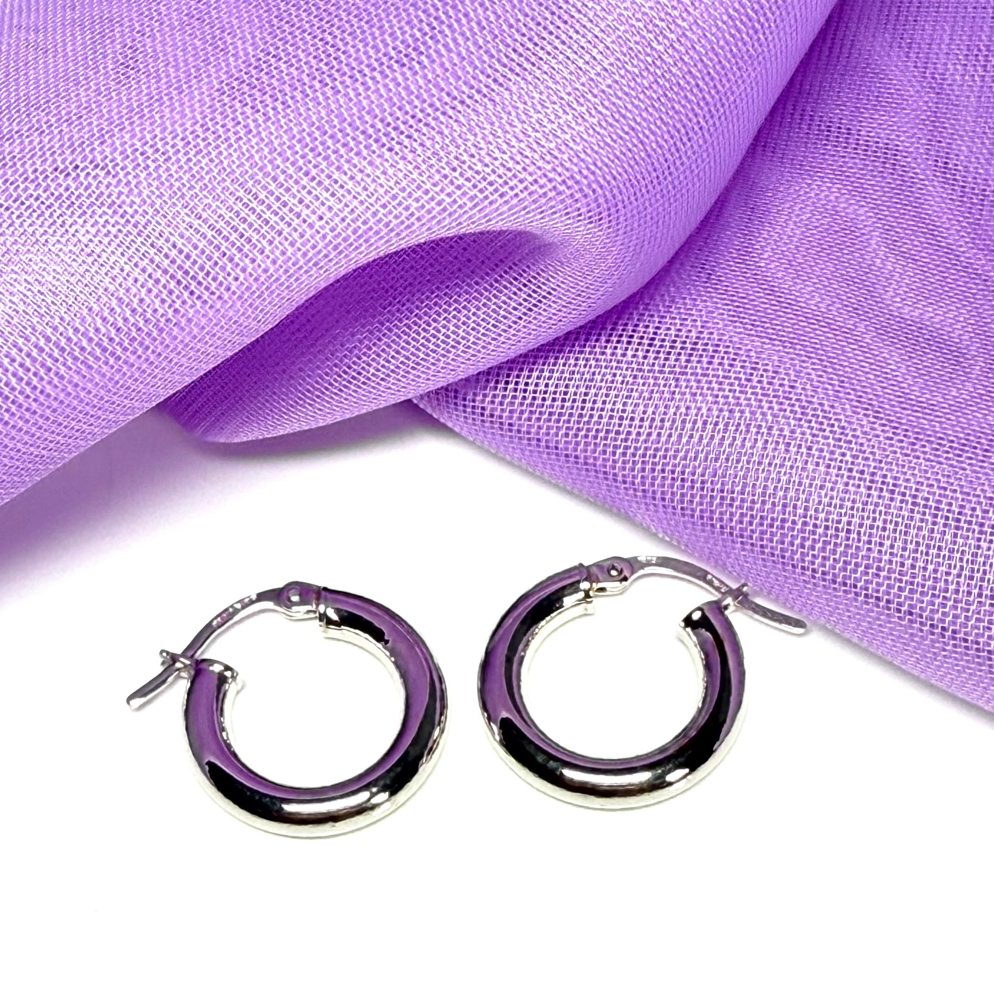 Plain highly polished white gold hoop earrings 16 mm